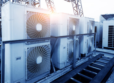 Air-conditioning units above the building roof.